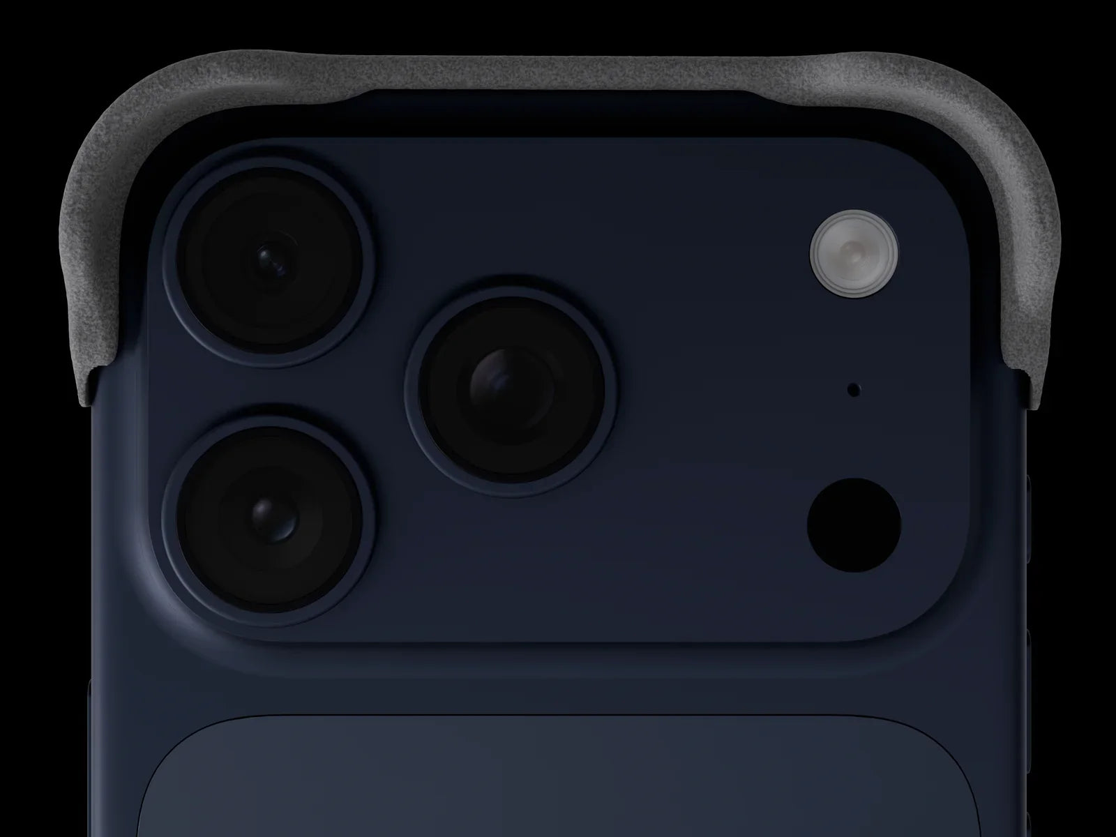 Phone Shell wrapping the camera corner of a deep blue iPhone 17 Pro, close-up from above